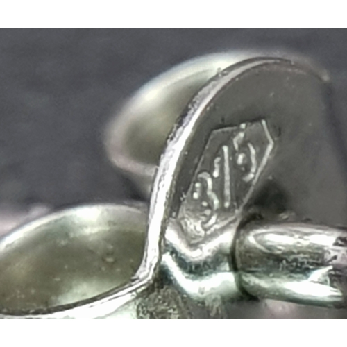 93 - A Pair of 9K White Gold Diamond Dress Earrings. c2ctw of round and baguette cut diamonds. Square stu... 