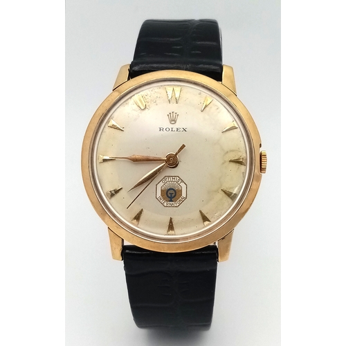 157 - A Rare Vintage Rolex Optimist International Gold Cased Watch. Black leather strap. Gold case - 34mm.... 