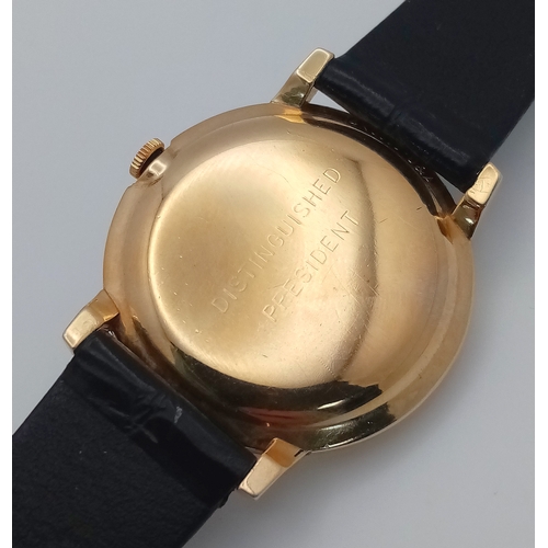 157 - A Rare Vintage Rolex Optimist International Gold Cased Watch. Black leather strap. Gold case - 34mm.... 