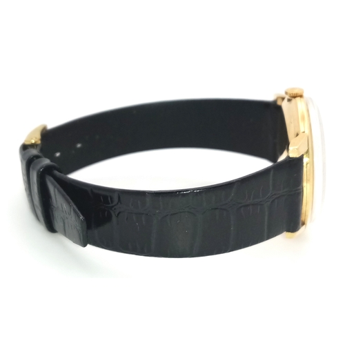 157 - A Rare Vintage Rolex Optimist International Gold Cased Watch. Black leather strap. Gold case - 34mm.... 