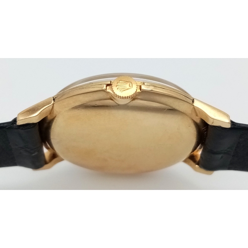 157 - A Rare Vintage Rolex Optimist International Gold Cased Watch. Black leather strap. Gold case - 34mm.... 