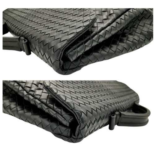 187 - A Bottega Veneta Black Intrecciato Leather Briefcase. Black leather exterior with silver-tone hardwa... 