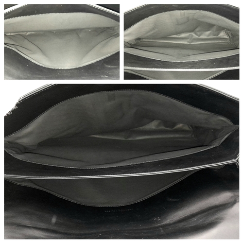 187 - A Bottega Veneta Black Intrecciato Leather Briefcase. Black leather exterior with silver-tone hardwa... 