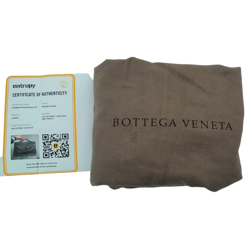 187 - A Bottega Veneta Black Intrecciato Leather Briefcase. Black leather exterior with silver-tone hardwa... 