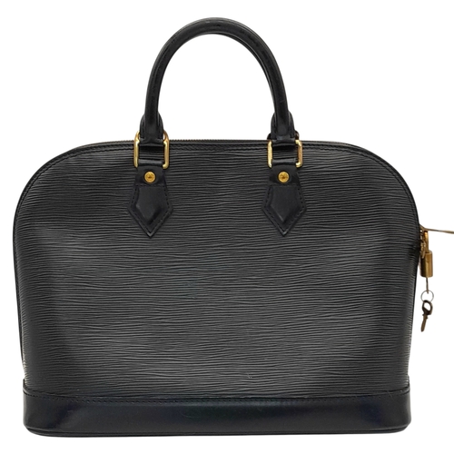 194 - A Louis Vuitton Black Epi Leather Alma PM Bag. Black Epi leather exterior with gold-tone hardware, d... 