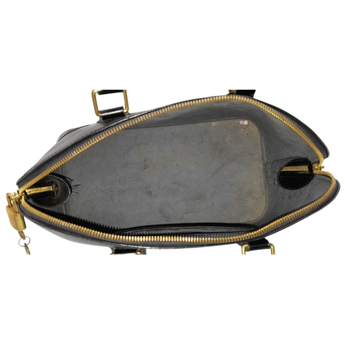194 - A Louis Vuitton Black Epi Leather Alma PM Bag. Black Epi leather exterior with gold-tone hardware, d... 