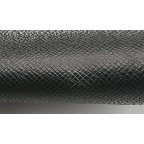 509 - A Louis Vuitton Taiga Baikal Leather Clutch Bag. Black leather exterior with silver-tone hardware, a... 