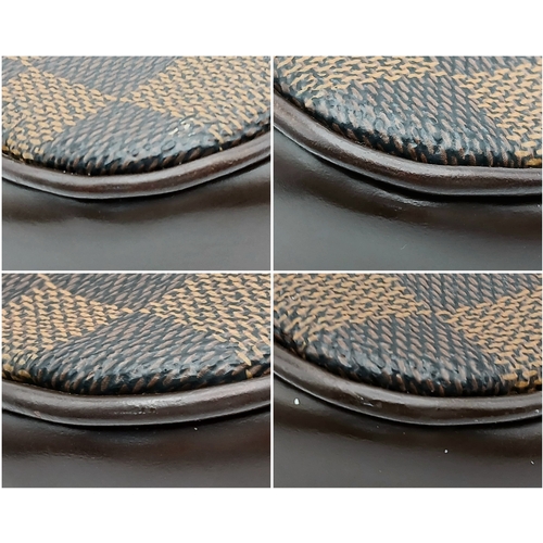 516 - A Louis Vuitton Brown Damier Ebene Pochette Accessoires. Brown Damier Ebene coated canvas exterior w... 