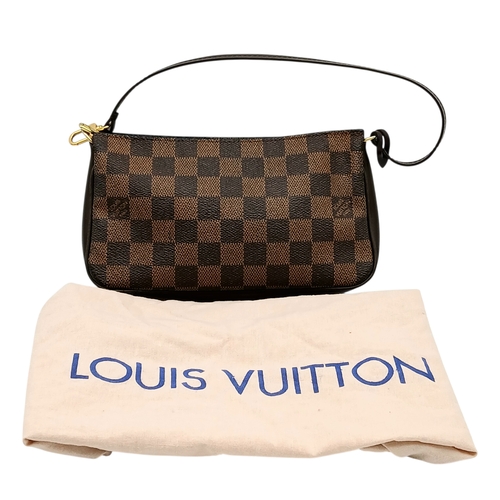 516 - A Louis Vuitton Brown Damier Ebene Pochette Accessoires. Brown Damier Ebene coated canvas exterior w... 