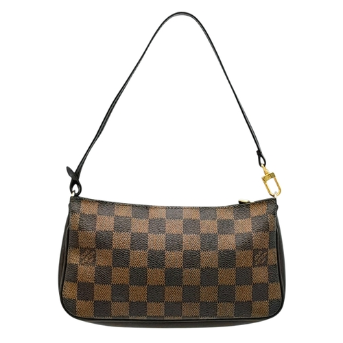 516 - A Louis Vuitton Brown Damier Ebene Pochette Accessoires. Brown Damier Ebene coated canvas exterior w... 