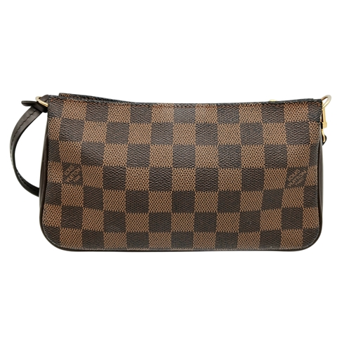 516 - A Louis Vuitton Brown Damier Ebene Pochette Accessoires. Brown Damier Ebene coated canvas exterior w... 