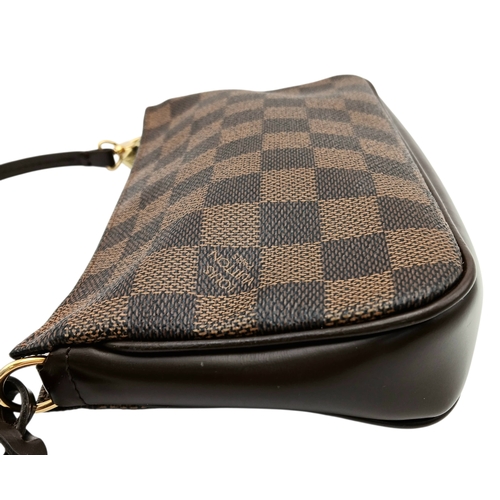 516 - A Louis Vuitton Brown Damier Ebene Pochette Accessoires. Brown Damier Ebene coated canvas exterior w... 