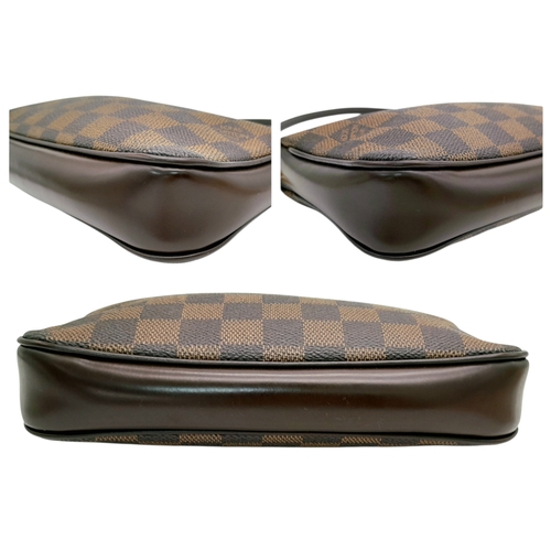 516 - A Louis Vuitton Brown Damier Ebene Pochette Accessoires. Brown Damier Ebene coated canvas exterior w... 