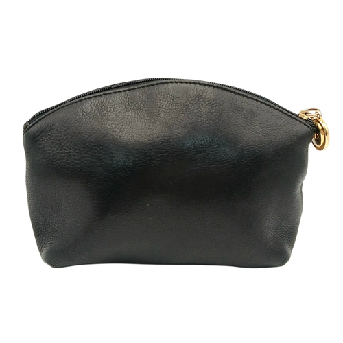 530 - A Christian Dior Black Leather Cosmetic Pouch. Black leather exterior with gold-tone hardware and to... 