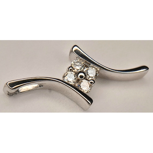 544 - AN 18K WHITE GOLD, DIAMOND SET PENDANT. 0.9G. SC 4046