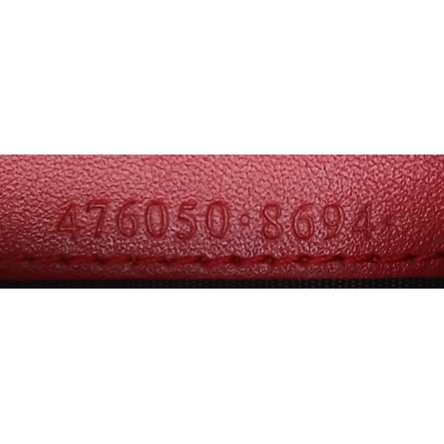 549 - A Gucci GG Supreme Cherry Card Holder Wallet. Ebony GG Supreme canvas exterior with gold-tone hardwa... 