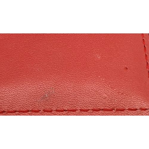 549 - A Gucci GG Supreme Cherry Card Holder Wallet. Ebony GG Supreme canvas exterior with gold-tone hardwa... 