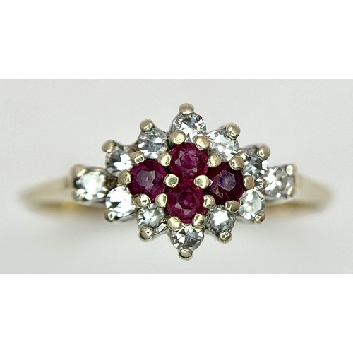 552 - A 9K YELLOW GOLD, DIAMOND AND RUBY RING. 1.5G, SIZE K. SC 4003