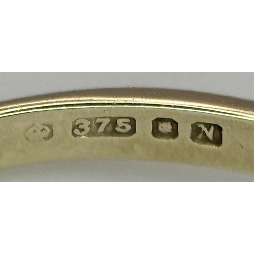 552 - A 9K YELLOW GOLD, DIAMOND AND RUBY RING. 1.5G, SIZE K. SC 4003