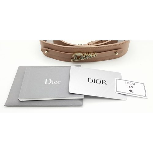 627 - A Lady Dior Pink Quilted Leather Top Handle Bag. Pink leather with dual rounded top handles, gold-to... 
