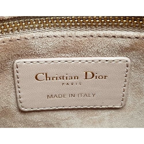 627 - A Lady Dior Pink Quilted Leather Top Handle Bag. Pink leather with dual rounded top handles, gold-to... 