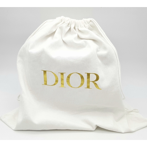 627 - A Lady Dior Pink Quilted Leather Top Handle Bag. Pink leather with dual rounded top handles, gold-to... 