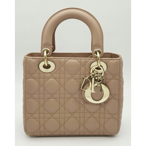 627 - A Lady Dior Pink Quilted Leather Top Handle Bag. Pink leather with dual rounded top handles, gold-to... 