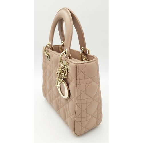 627 - A Lady Dior Pink Quilted Leather Top Handle Bag. Pink leather with dual rounded top handles, gold-to... 