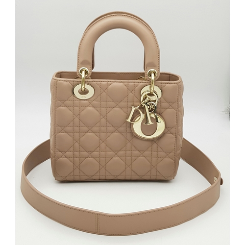 627 - A Lady Dior Pink Quilted Leather Top Handle Bag. Pink leather with dual rounded top handles, gold-to... 