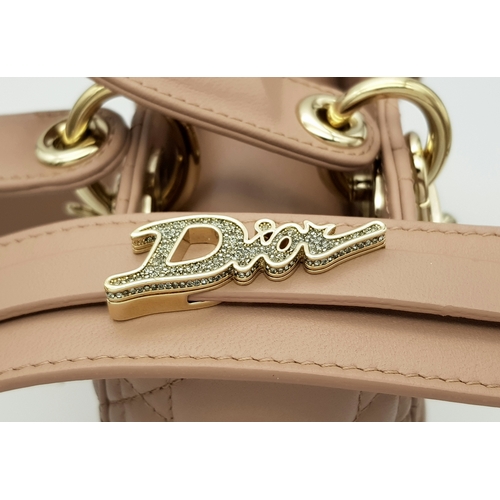 627 - A Lady Dior Pink Quilted Leather Top Handle Bag. Pink leather with dual rounded top handles, gold-to... 