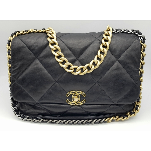 965 - A Chanel Black Quilted Leather Classic Flap Shoulder Bag. Black quilted leather exterior with gold-t... 