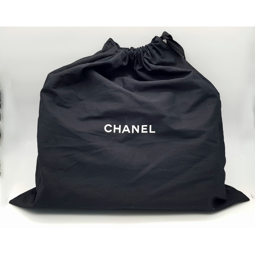965 - A Chanel Black Quilted Leather Classic Flap Shoulder Bag. Black quilted leather exterior with gold-t... 