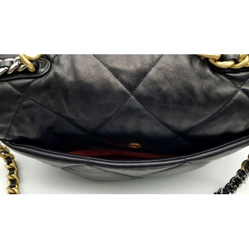 965 - A Chanel Black Quilted Leather Classic Flap Shoulder Bag. Black quilted leather exterior with gold-t... 