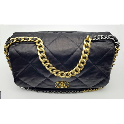 965 - A Chanel Black Quilted Leather Classic Flap Shoulder Bag. Black quilted leather exterior with gold-t... 