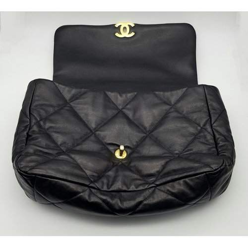 965 - A Chanel Black Quilted Leather Classic Flap Shoulder Bag. Black quilted leather exterior with gold-t... 