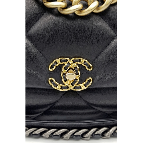 965 - A Chanel Black Quilted Leather Classic Flap Shoulder Bag. Black quilted leather exterior with gold-t... 