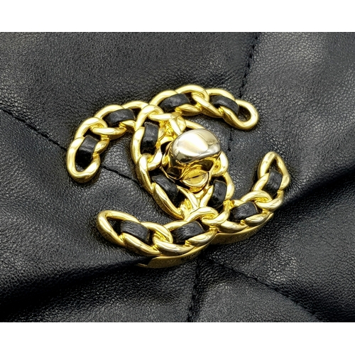 965 - A Chanel Black Quilted Leather Classic Flap Shoulder Bag. Black quilted leather exterior with gold-t... 