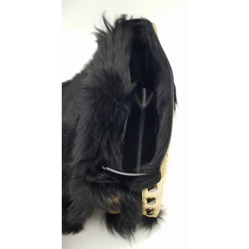 1006 - A Jimmy Choo Gold Metallic Textile and Black Fur Shoulder Bag. Gold metallic textile exterior with b... 