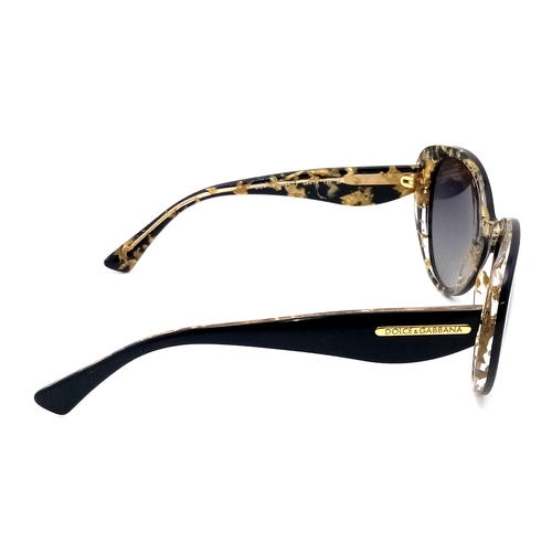 1013 - A Pair of Dolce and Gabbana Ladies Sunglasses. With pouch.    STK026390