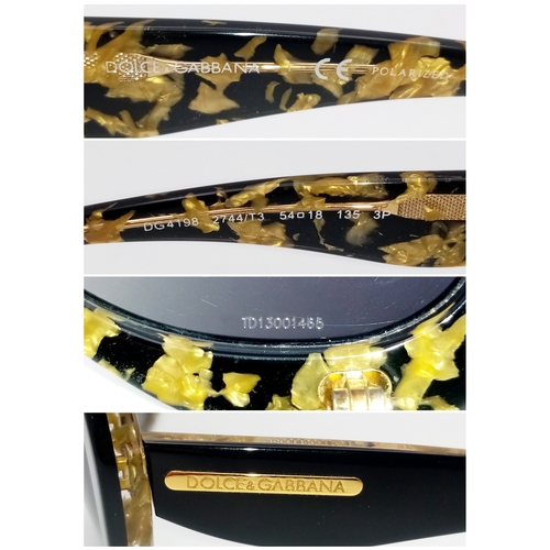 1013 - A Pair of Dolce and Gabbana Ladies Sunglasses. With pouch.    STK026390