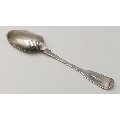 1038 - AN ANTIQUE VICTORIAN SOLID SILVER TABLE SPOON .     59.8gms