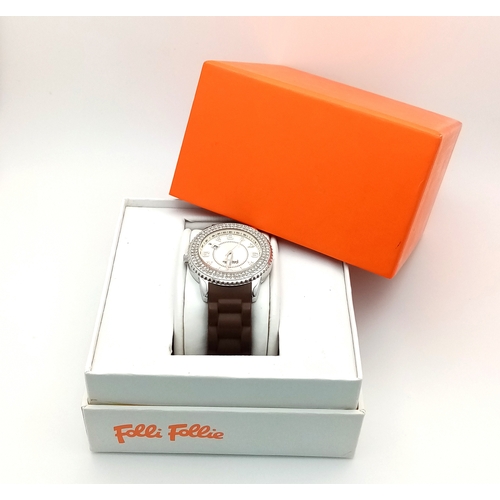 A FOLLI FOLLIE, STONE SET, BROWN RUBBER STRAP WATCH, WITH  display picture 1
