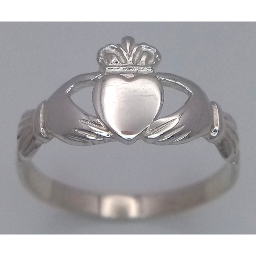 1051 - A STERLING SILVER, CLADDAGH DESIGN RING. 1.8G, SIZE Q. 8397