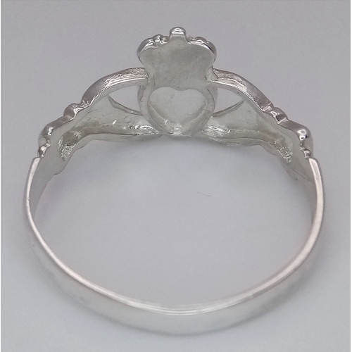 1051 - A STERLING SILVER, CLADDAGH DESIGN RING. 1.8G, SIZE Q. 8397