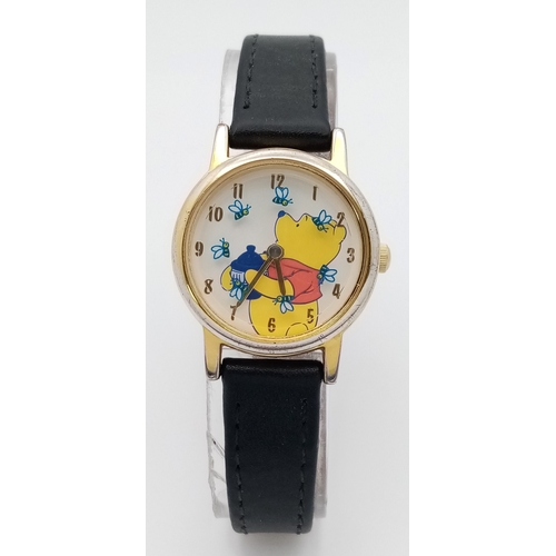 1057 - A WINNIE THE POOH, EXCLUSIVE FOR DISNEY, LEATHER STRAP WATCH. THE BEES MOVE AROUND THE DIAL AS THE S... 