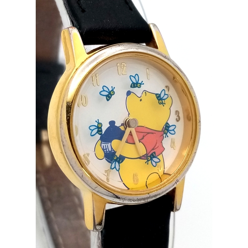 1057 - A WINNIE THE POOH, EXCLUSIVE FOR DISNEY, LEATHER STRAP WATCH. THE BEES MOVE AROUND THE DIAL AS THE S... 