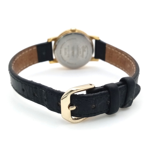 1057 - A WINNIE THE POOH, EXCLUSIVE FOR DISNEY, LEATHER STRAP WATCH. THE BEES MOVE AROUND THE DIAL AS THE S... 