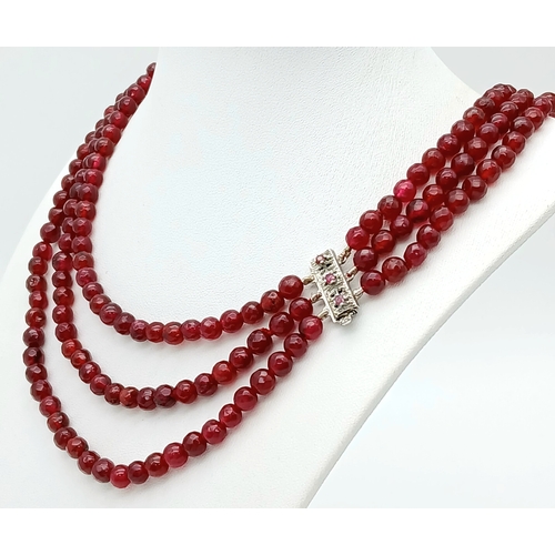 1032 - A Three Row Garnet Necklace with Silver Clasp. 44-46cm. ML20