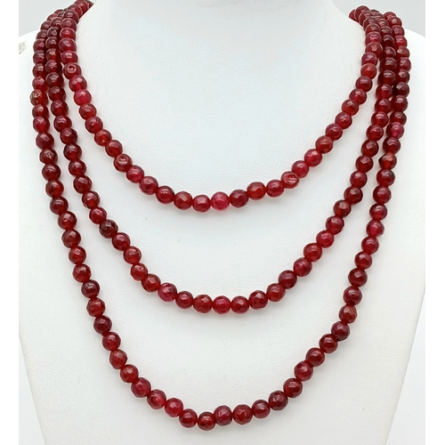 1032 - A Three Row Garnet Necklace with Silver Clasp. 44-46cm. ML20