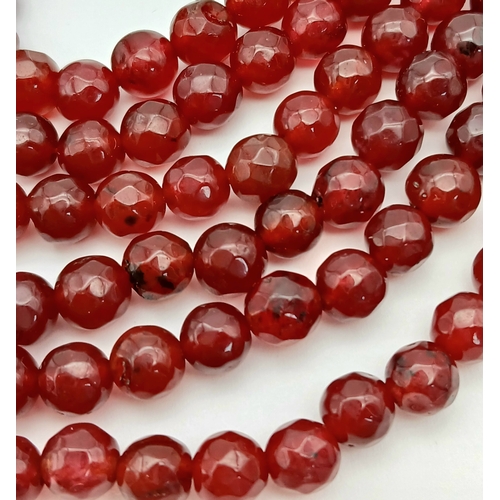 1032 - A Three Row Garnet Necklace with Silver Clasp. 44-46cm. ML20